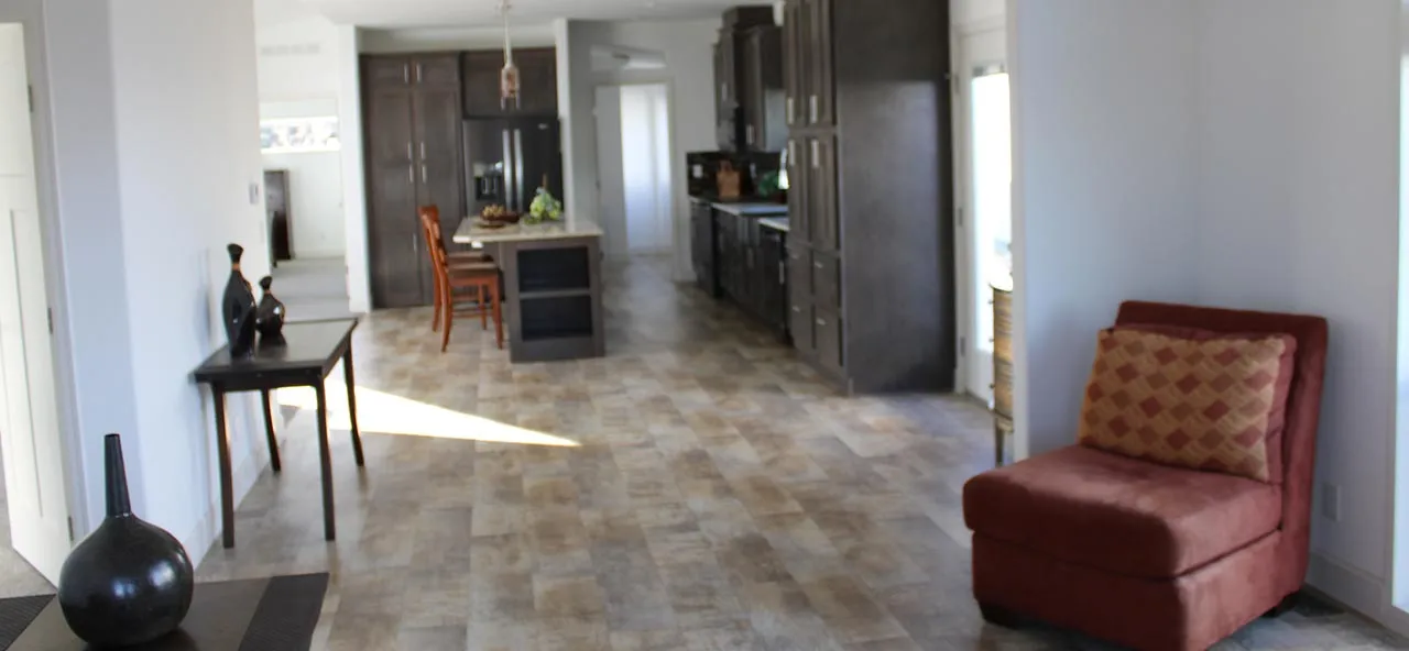 Finished kitchen and living room inside a home